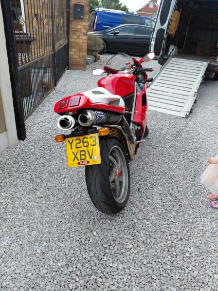 Used Ducati ready to be loaded for motorcycle collection and delivery