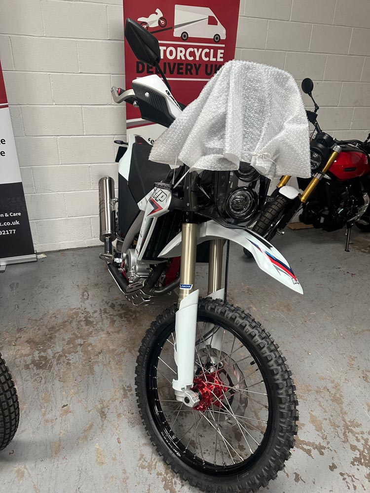 Motorcycle protected while inside the Motorcycle Delivery UK storage facility