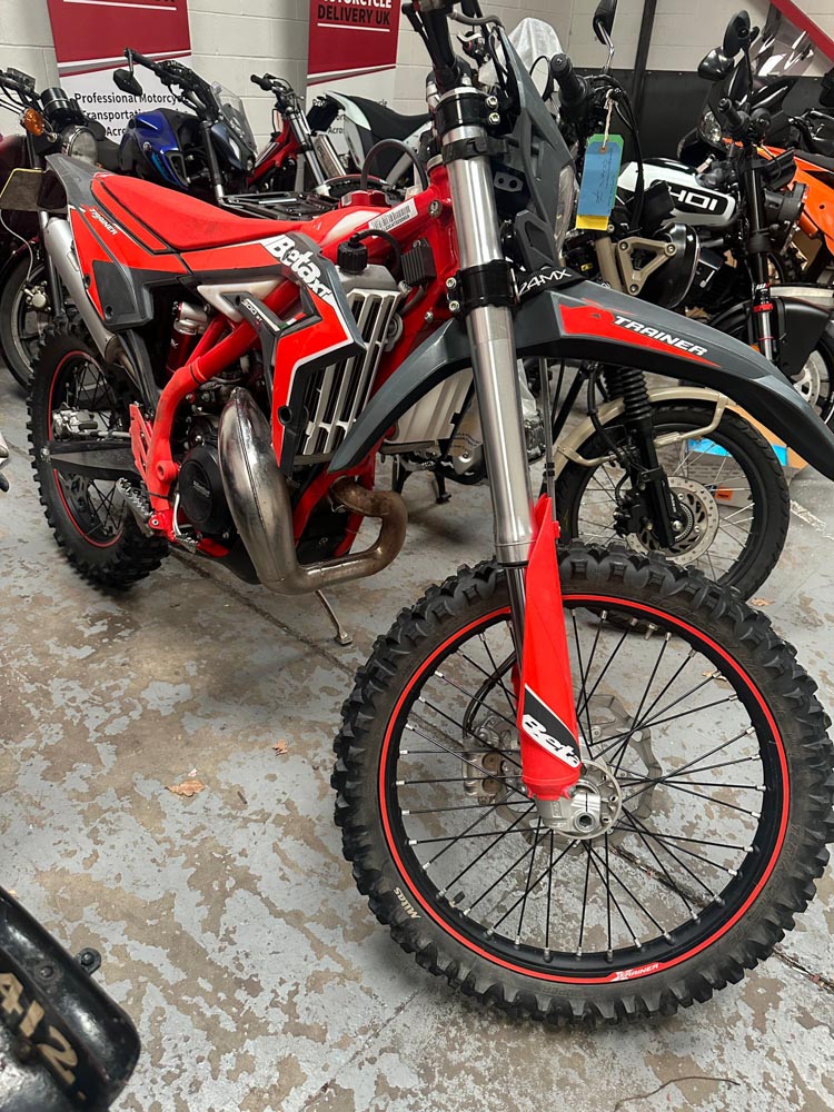 Off-road motorcycle in secure indoor motorcycle storage in the UK