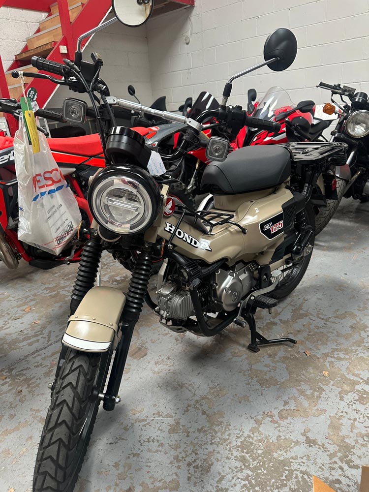 Small motorcycle inside Motorcycle Delivery UK's secure indoor storage facility